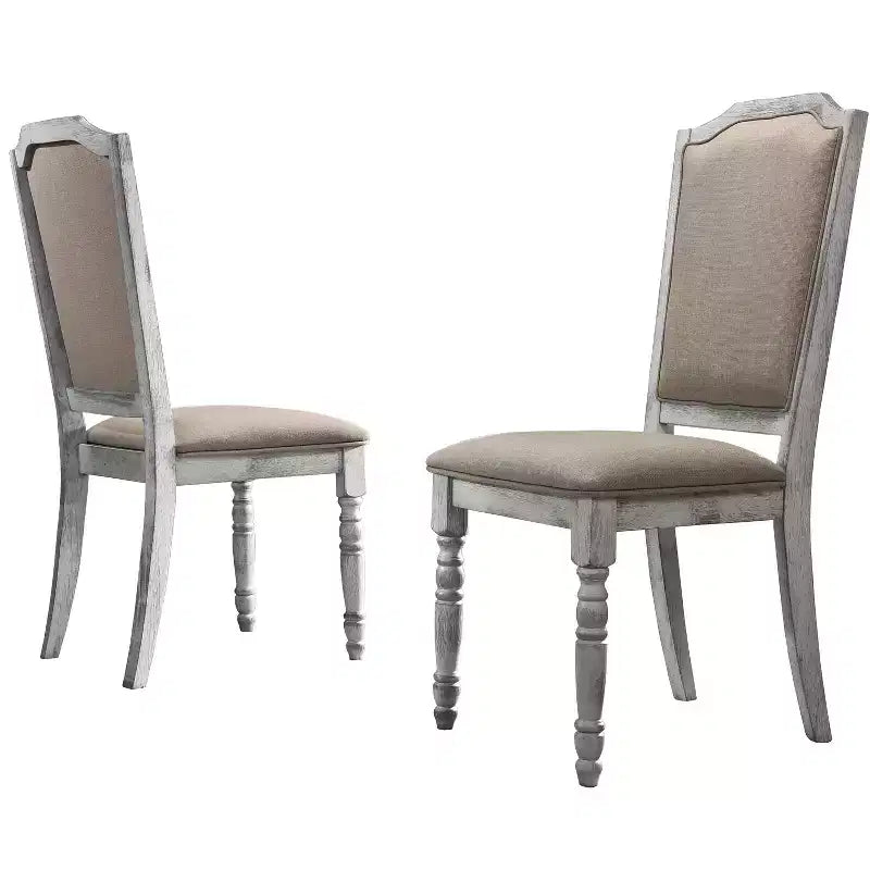 Chaise de salle à manger transitionnelle en bois tapissée avec pieds tournés