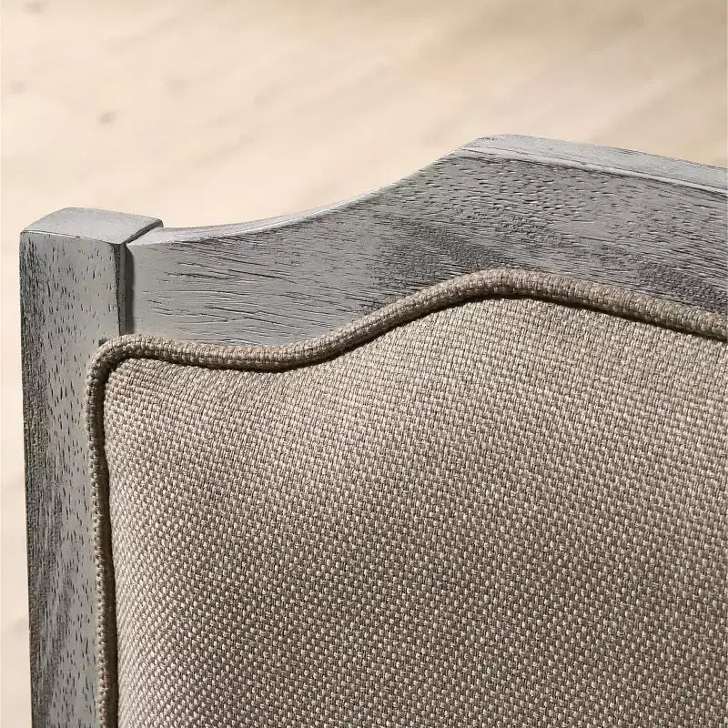 Chaise de salle à manger transitionnelle en bois tapissée avec pieds tournés