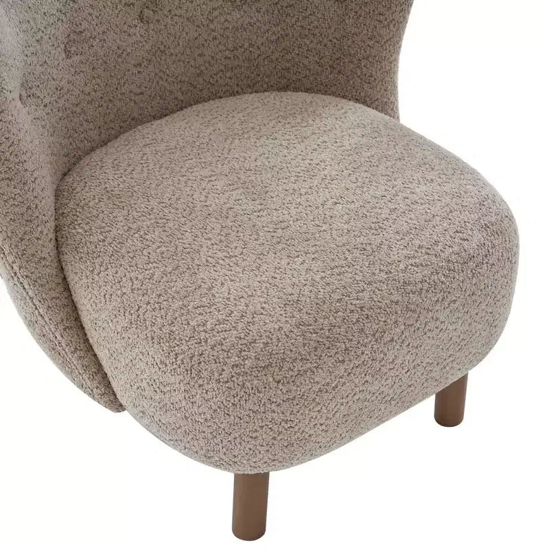 Fauteuil d'appoint avec dossier incurvé et pieds en bois de bouleau